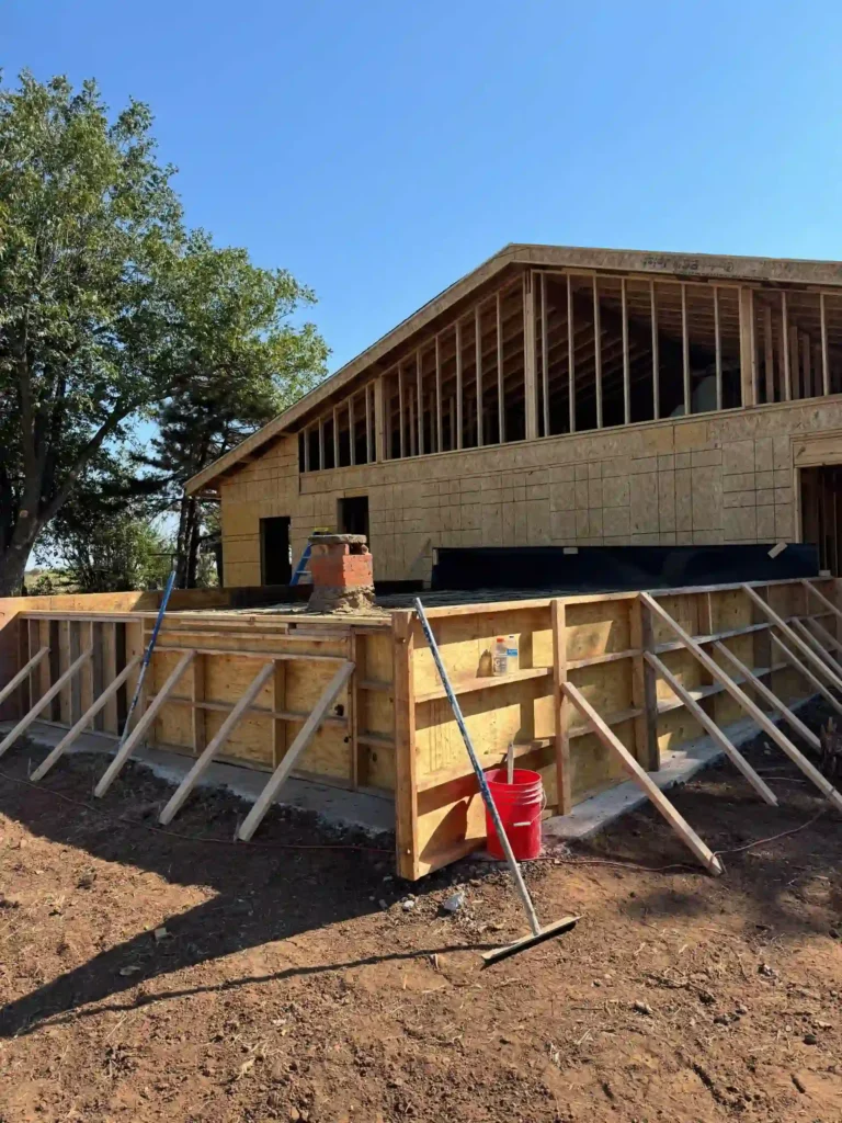 Construction site with house made of wood (1)
